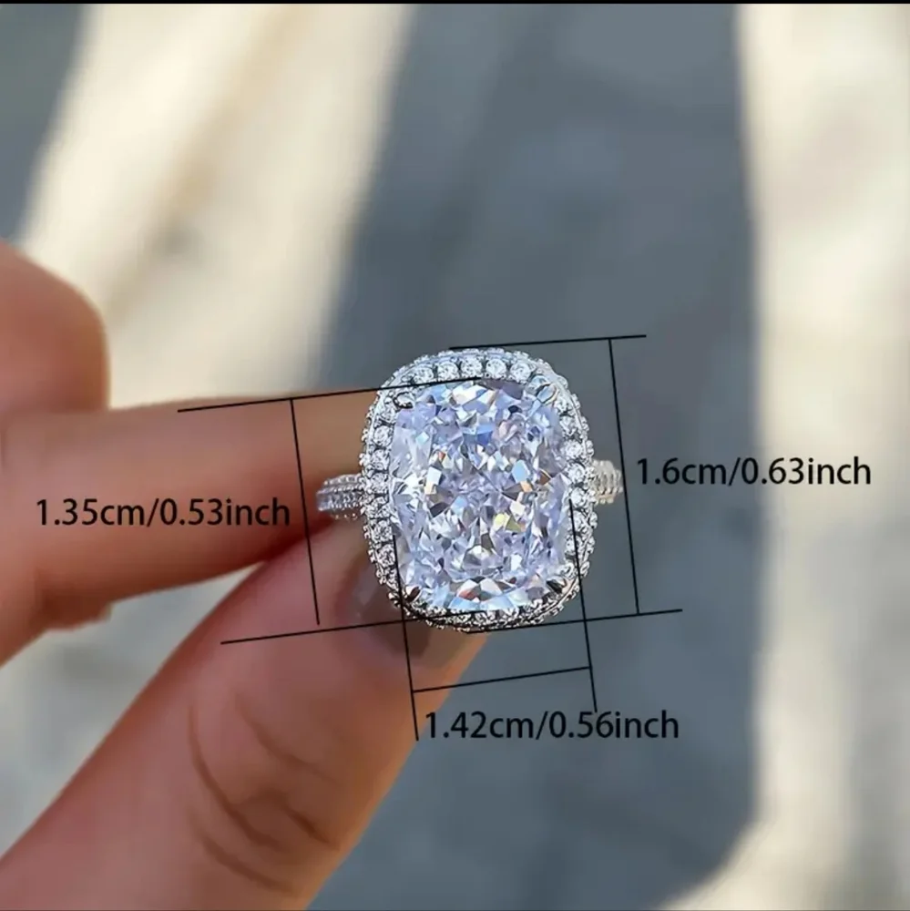 Oval Halo Engagement Ring in Clear and Silver